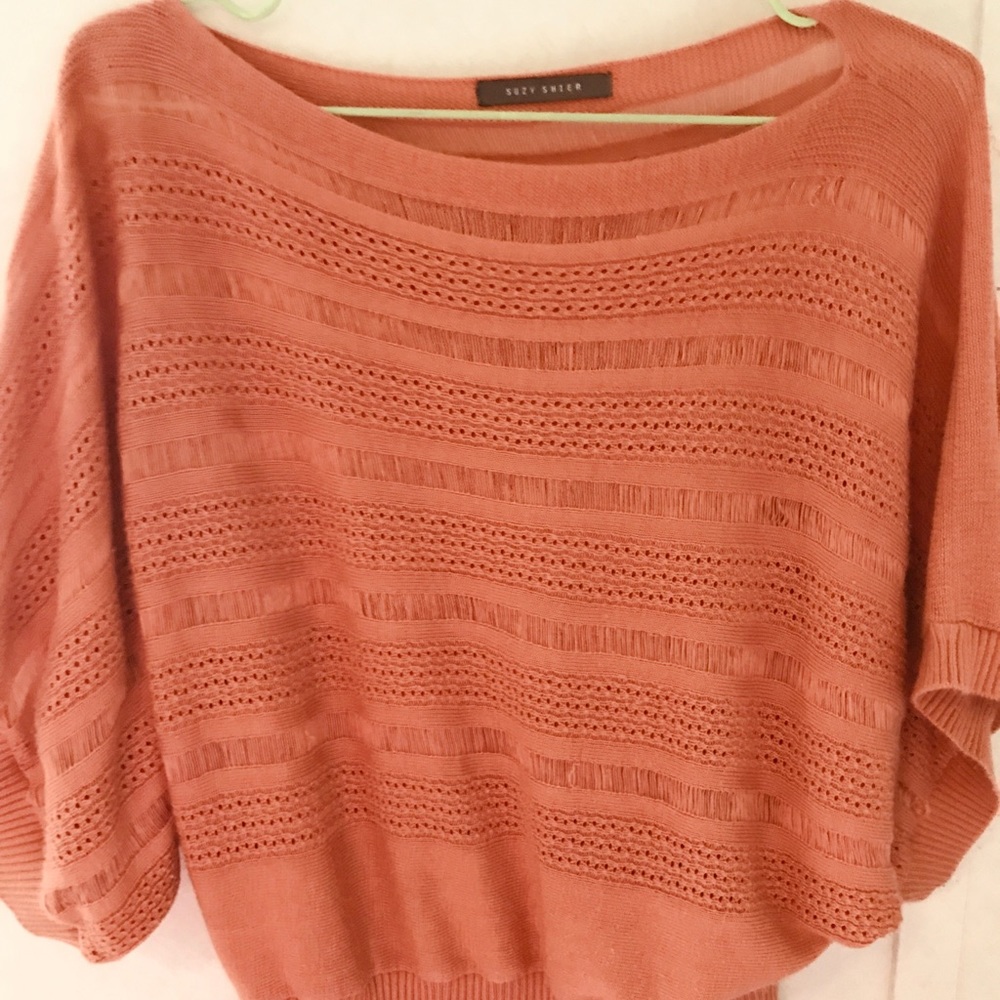 An off the shoulder ladies shirt/sweater